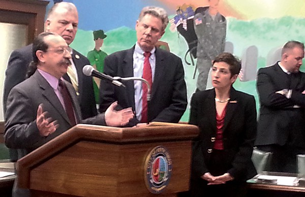 Sweeney, Pallone, and Berger listen as Perth Amboy Resident George Bonilla speaks of the challenges he has encountered after Superstorm Sandy hit.