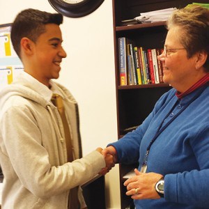 Photo: Senior student Ian Baldera, left, and Dr. Deborah Egan, right, Principal at AULCHS. Photo submitted
