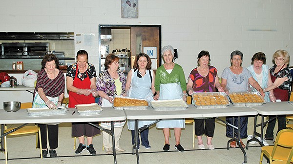 The ladies of St. Demetrios Greek Orthodox Church prepare pastries for the Greek Festival on May 30, 31 & June 1. *Photo by Paul W. Wang