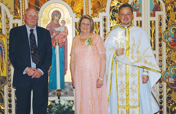 Anton and Marcella Massopust renew their vows at Ukrainian Assumption Church with Rev. Ivan Turyk.