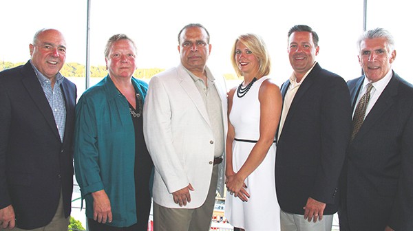 PERTH AMBOY - At the cocktail reception, from left, Raritan Bay Medical Center President and CEO Michael R. D’Agnes, 2014 Harbor Lights Ball honorees Dr. Nina Regevik, Dr. Puneet Sahgal, Ann and Vito Mazza and Chairman of the Raritan Bay Medical Center Foundation Russ Azzarello.