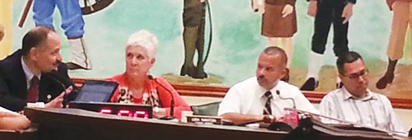 Council Members Bill Petrick, Lisa Nanton, Council President Joel Pabon and Council Member Fernando Irizarry discuss issues at the 8/13/14 Council Meeting.