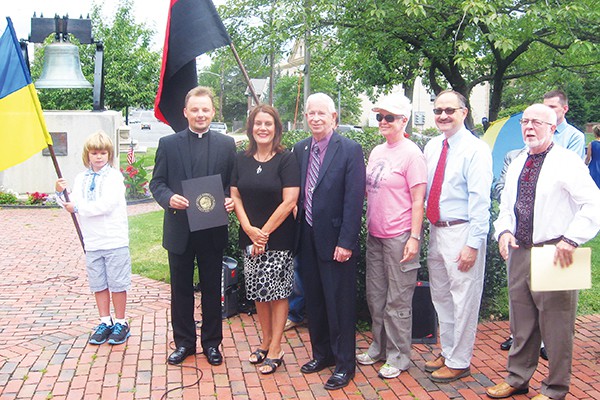 Rev. Turyk receives a proclamation from Mayor Diaz, along with Counicl Members Lisa Nanton and Bill Petrick