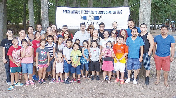 PAMA President Reyes Ortega (Center) with family and other attendees.