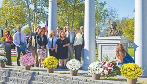 Perth Amboy Mayor Wilda Diaz accepts the gift of the Juan Pablo Duarte Monument as a gift to the City from the JPD Committee and the Dominican Community. (L to R) Manuel Nunez, Victor Quezada (back), Rosendo Guerra, Mayor Wilda Diaz, Millie Abreu, Fredy Rodriguez, Lidia Abreu, Fredy Perez, Samuel Lebreault, Enrique Hernandez, Inosencio Pena and Damaris Diaz. *Photos Submitted by Naty Abreu