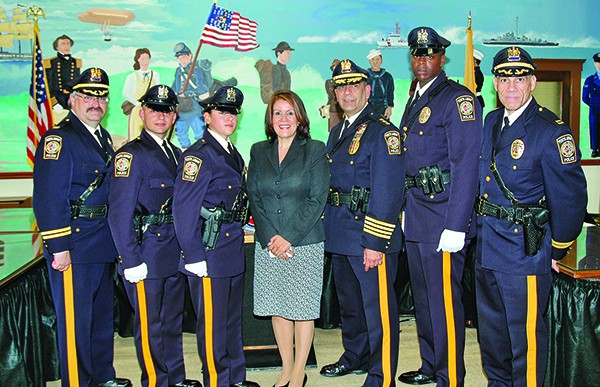 Police Chief Benjamin Ruiz, third from right, at swearing-in ceremony for police officers in June 2014.