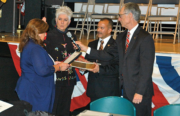 Lisa Nanton is sworn in as Council President by City Clerk Elaine Jasko. Joel Pabon whom Nanton succeeded as President holds the Bible while City Attorney Mark Blunda holds the mic. *Photo by Paul W. Wang