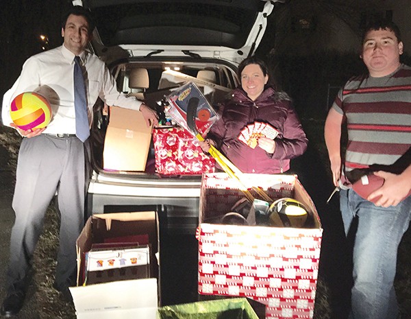 Donation drop off. (L to R) is me (Randy Thompson, Help Not Handcuffs Campaign Founder), Katie Tomasso, Director of Epiphany House and Andrew Gibson a Help Not Handcuffs’ Volunteer. The picture shows off the donations but we could not take pictures with the actual recipients due to privacy concerns. *Photo Submitted
