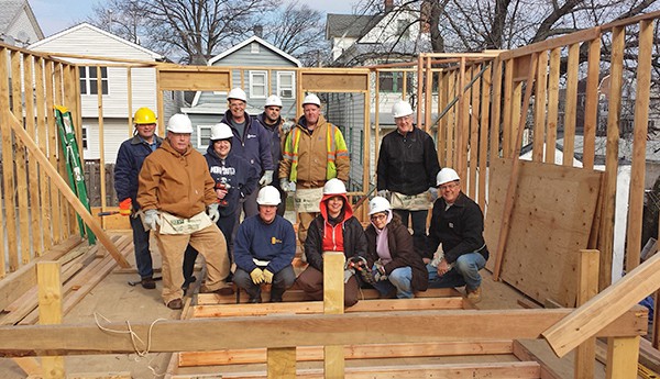 PERTH AMBOY - Middlesex Water Company employees volunteered on a Habitat for Humanity project building a home in the City of Perth Amboy. Pictured L to R (front row): Greg Risoldi, Dan Krakowski, Summer DeFeo, Raquel Koukourdelis, Chris Andresen (back row): Bill Maxwell, Bernadette Sohler, Rick Nolan, Alex Albelo, Gary Colfer and Dennis Doll.