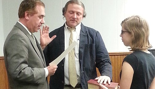 SOUTH AMBOY - Second Ward Councilman Thomas Reilly is sworn in by Assemblyman Craig Coughlin at the 2/18/15 Council Meeting. Reilly’s niece held the bible. *Photo by Carolyn Maxwell