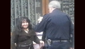 Sharon Hubberman and Deputy Chief Larry Cattano engage in a conversation after the 3/25/15 Council Meeting
