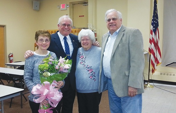 Mayor Henry is stands with his proud family after delivering the State of the City Address. Pictured above (L to R) is his wife, Linda whom he presented flowers, his mother, Anne and brother, Bill.