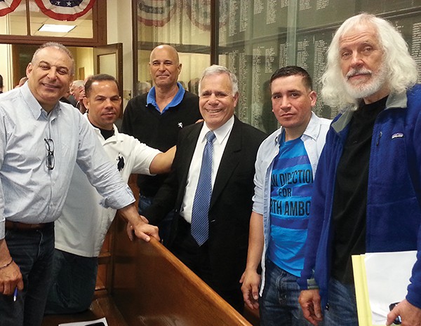 Former City Council Candidate Miguel Nunez (Far Left) Community Activist Alan Silber (Far Right) along with others surround Fernando Gonzalez (3rd From Right) who they supported in the May 12, 2015 Special Election where Gonzalez won the last seat on the City Council.