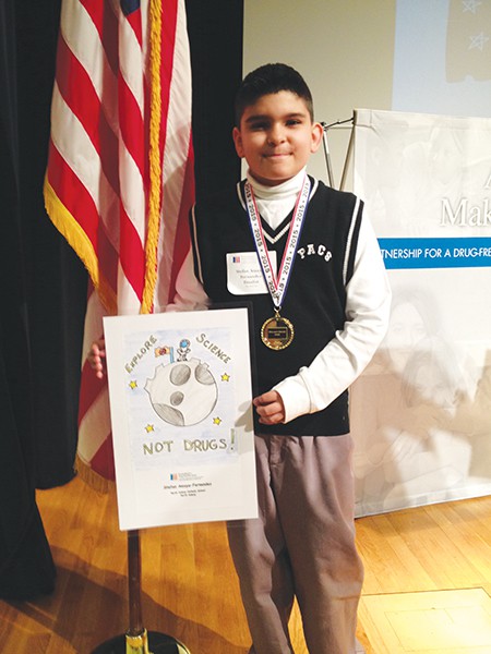 PERTH AMBOY - Stefan Amaya-Fernandez, a 4th Grade student at Perth Amboy Catholic School, was a finalist in The Partnership for a Drug Free New Jersey 4th Grade Folder Art Contest. Stefan’s entry was chosen from among 8000 entries submitted in the “Fun Things to Do Instead of Drugs” Folder Competition. Only 30 finalists were chosen from the entire state of New Jersey. Stefan was invited with his family and Art teacher. Mrs. Rose Pennyfeather to The Newark Museum for the Award Ceremony on April 29th, 2015. He received a medal, a reproduction of his artwork, a buffet brunch and a tour of The Newark Museum with his family.
