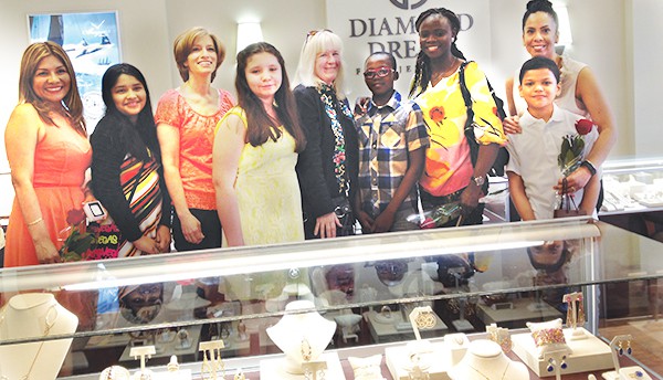 Press Release 5/11/15 PERTH AMBOY - Four Perth Amboy Catholic School Students won precious jewels in the Diamond Dream Fine Jewelers Essay contest for Mother’s Day. Mr. & Mrs. Edward Shapiro of Diamond Dream Fine Jewelers in Bernardsville, N.J. asked elementary school students to write an essay entitled “My Mom Shines Like a Diamond.” Perth Amboy Catholic School, under the direction and guidance of Rose Pennyfeather and Sr. Rebecca Piatek had 4 student essay winners out of the 10 essays chosen from Middlesex, Somerset, Hunterdon, Morris and Union counties. The winners were Damilola Borishade, 2nd place, (Diamond), Katelynn Barcheski, (Garnet), Nicole Rosas-Bendrell (Peridot) and Joel Sierra (Garnet). The students and their mothers attended the Award Ceremony on Saturday, May 2nd at 3 p.m.