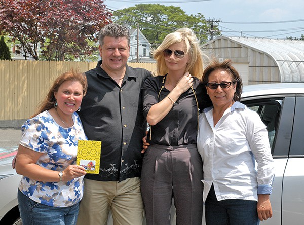 $500 Gift Card Winner Colleen Young, Grand Prize 2015 Chevorlet Cruz Winner Piotr Zuraw; Raffle Committee Chairs Anna Krol and Ana Zevallos