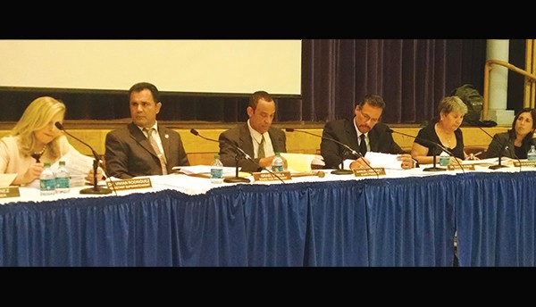 The Board listens as the public express their disdain with the newly proposed regulations on public speaking at BOE Meetings. (L to R) Assistant Superintendant Dr. Vivian Rodriguez, Vice President Israel Varela, President Sam Lebrealt, Newly Hired Superintendant Dr. David Roman, Board Member Obi Gonzalez and Board Attorney Isabel Machado. *Photo by Katherine Massopust