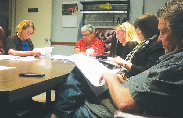 B.A. Camille Tooker confers with the Council and City Clerk during the 10/7/15 Business Meeting. *Photo by Carolyn Maxwell