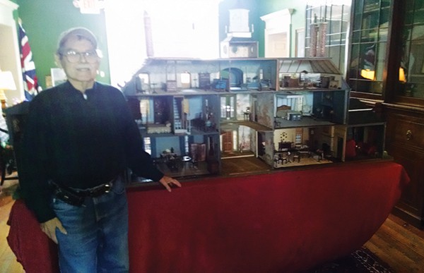 Artist Tom Ward poses next to a doll house he made on display at the Proprietary House. Photo taken on 10/4/15. *Photo by Katherine Massopust