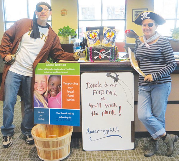 Amboy Bank Sayrewoods office bankers become pirates for the day during Amboy’s Halloween kick off of its annual bank wide food drive. All offices will be collecting food during November.*Photo submitted by Amboy Bank