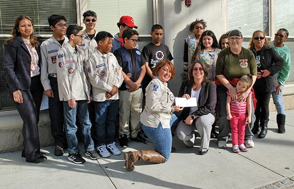 The Girl Scouts and Royal Rangers pose for photos at the Kearny Cottage. A check was presented from the The Eddie and Brenda Trujillo Family Foundation to help with the project. More pictures below. *Photos by Paul W. Wang