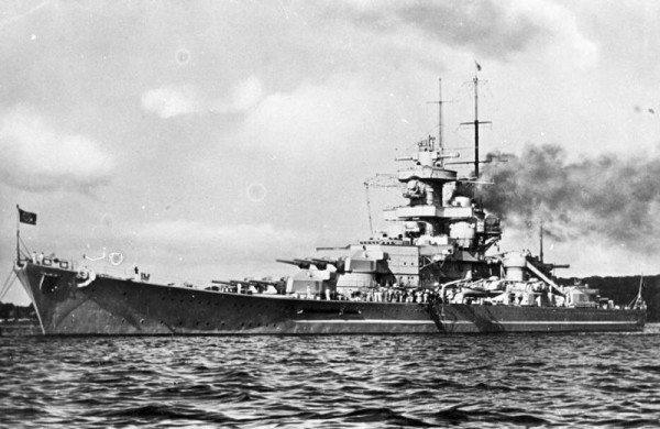 The German battleship Gneisenau is badly damaged by a British torpedo plane during an exercise off the port of Brest, Occupied France.