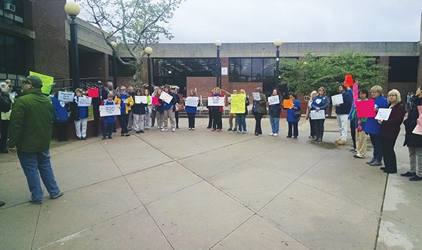 PERTH AMBOY - The PA-AFT protested in front of Perth Amboy High School before the 5/4/16 Board of Education Meeting. Educators and employees took turns speaking about their hardships due to paying exorbitant amounts for health insurance. The union still is yet to sign a contract with the Board of Education. They again marched into PAHS Auditorium before the meeting to make their voice heard.