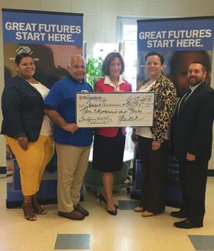 Accepting the Donation *Photo Submitted