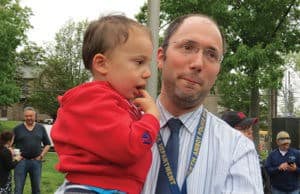Rabbi Ari Saks of Congregation Beth Mordecai with his son