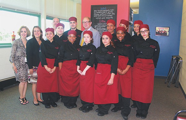 Culinary arts students on the Perth Amboy Campus of the Middlesex County Vocational and Technical Schools are joined by, from left, Perth Amboy Superintendent of Senior Services Dianne Roman, Mayor Wilda Diaz, Culinary Arts Instructor Stephen J. Moir, and state Secretary of Agriculture Douglas H. Fisher. * Photo Submitted