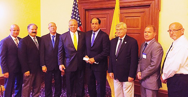 (L to R) John Donnadio, Executive Director for New Jersey Association of Counties, Freeholder Chairman Frank Formica, Atlantic County, Michael Oppegaard, Emergency Management Coordinator, Monmouth County, Senate President Steve Sweeney, Senator Joseph Vitale, Freeholder Peter Palmer, Somerset County, Michael Laffey, Director of Operations, Cape May County, Vince Jones, Emergency Preparedness Director, Atlantic County *Photo Submitted