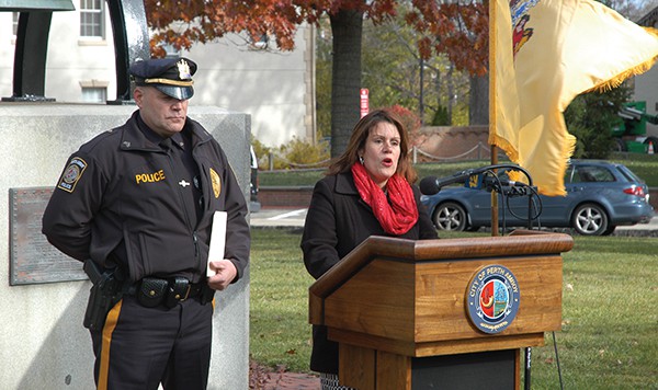 Mayor Wilda Diaz (R) takes a stance on Undocumented Immigrants. Sgt. Richard Zaleski (L) listens as Diaz makes her speech. *Photos by Paul W. Wang