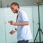 A staff member entertains the residents