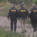 Captain Luis Guzman, Chief Benjamin Ruiz, and Captain Larry Cattano investigate the scene