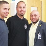 Edwin Nieves (R), Principal of the Richardson School was available to offer any assistance that day. He is shown with Security Officer Pete Roman (C) and a visitor. The program was a success and parents would like to see it done twice a year.