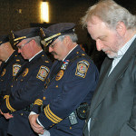 WCTC Radio Personality Bert Baron stands next to Deputy Police Chief Larry Cattano during the Invocation