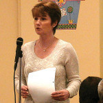 President Mary Szaro welcomes the visitors.