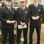 South Amboy Fire Chief Mike Geraltowswki with honorees Tom and Dave Szatkowski.